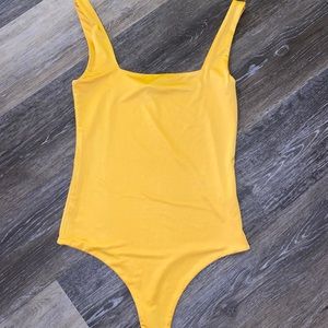 Brand new bodysuit from Laura’s boutique mustard